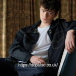 Owen Cooper posing at the premiere of the Netflix series Adolescence.